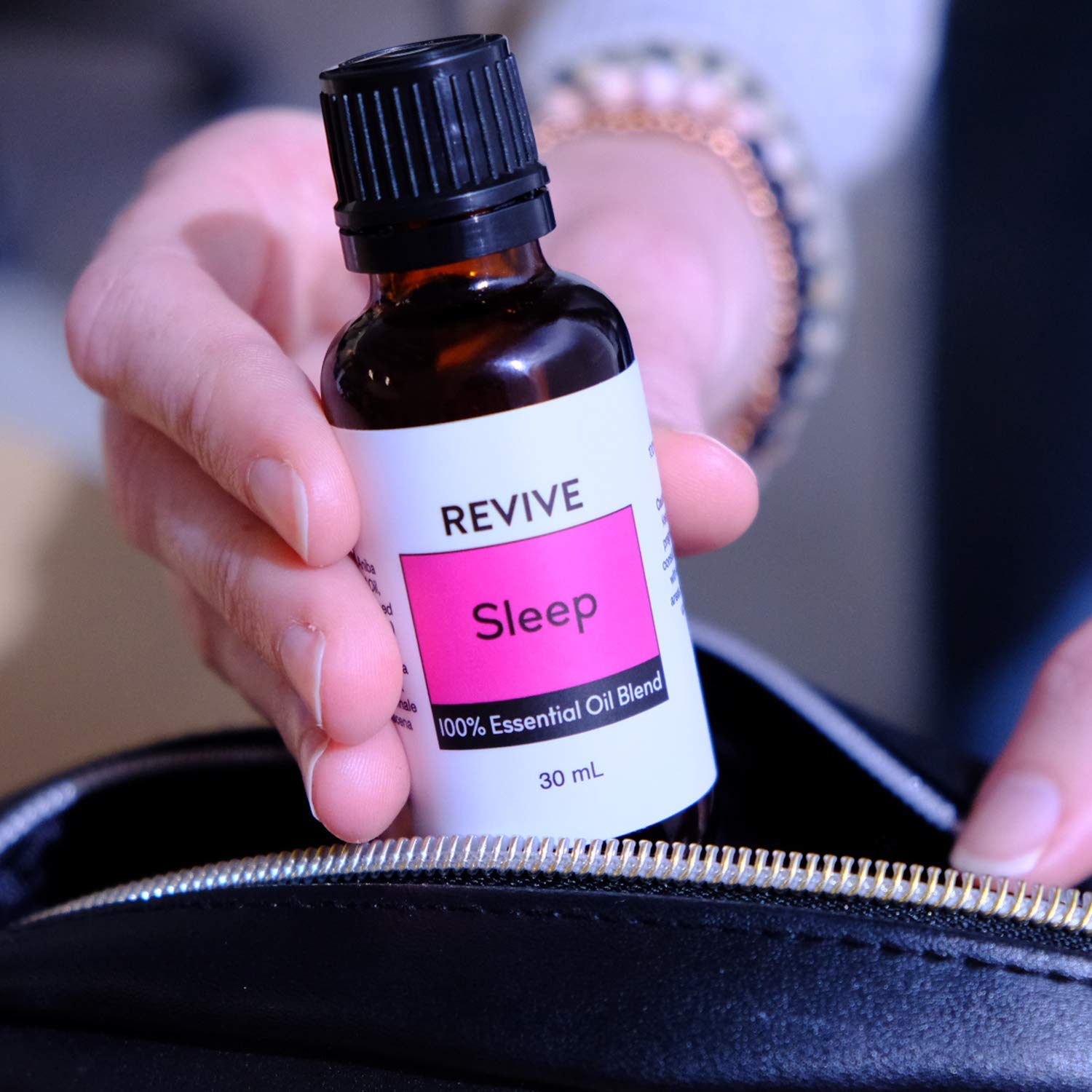REVIVEEO Sleep ingredient closeup featuring geranium and lavender notes.