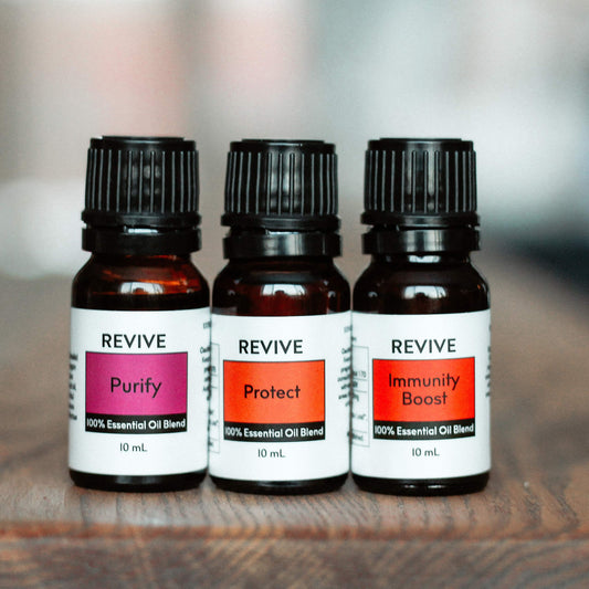 REVIVEEO Protect 10ml bottle pour promotes a calming atmosphere.