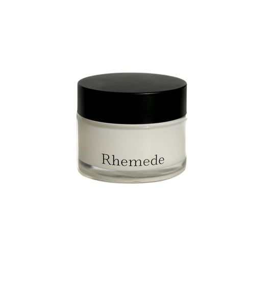 Rhemede Restoration Balm jar close-up displaying soothing skin-quality texture