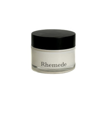 Rhemede Restoration Balm jar close-up displaying soothing skin-quality texture