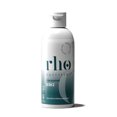 Rho Nutrition Liposomal D3K2 bottle closeup showing high-absorption design for immune support.