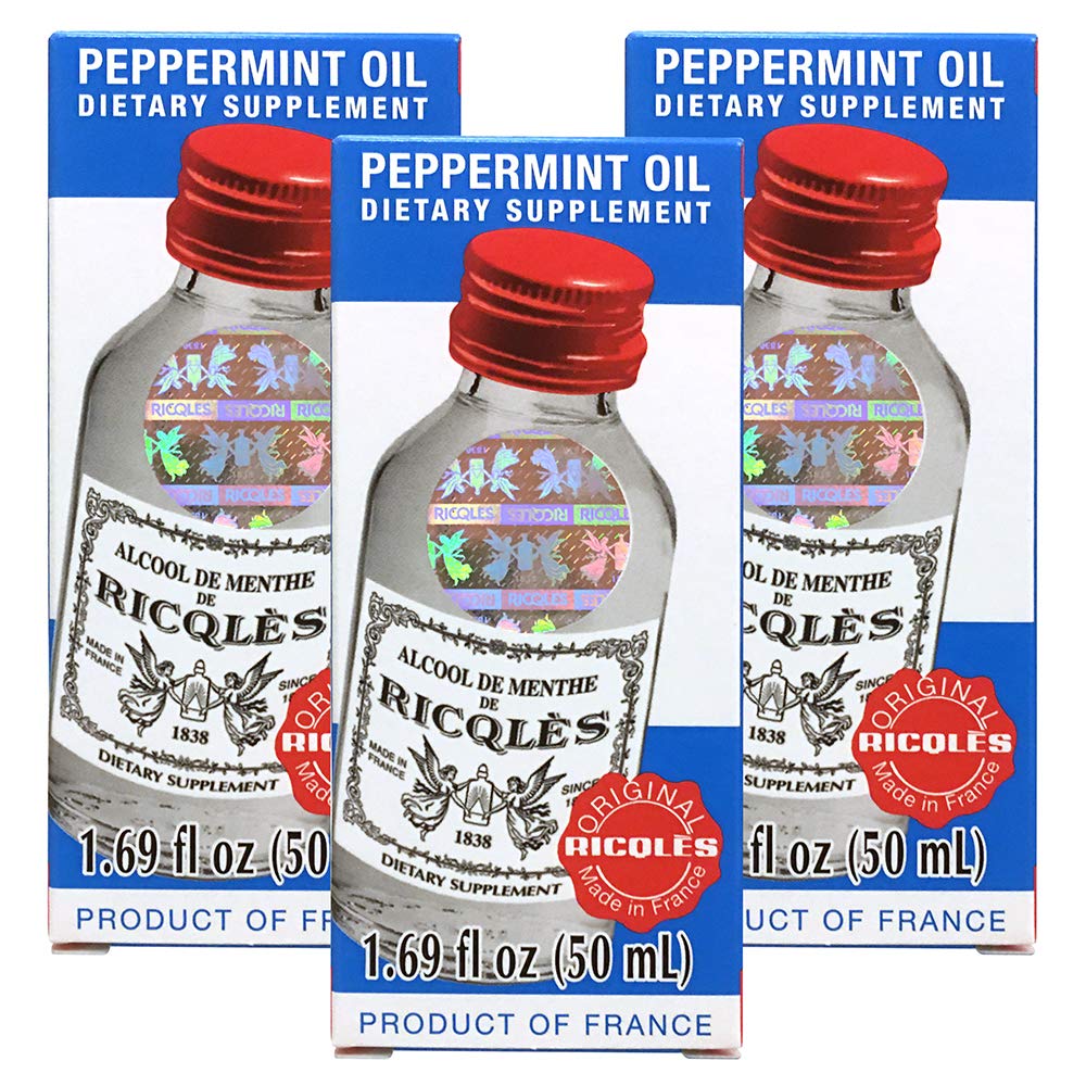 Ricqles Peppermint Oil bottle close-up, sleek packaging for digestion support.