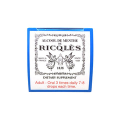 Ricqles Peppermint Oil capsules on a clean surface, a discreet dietary option for digestion.