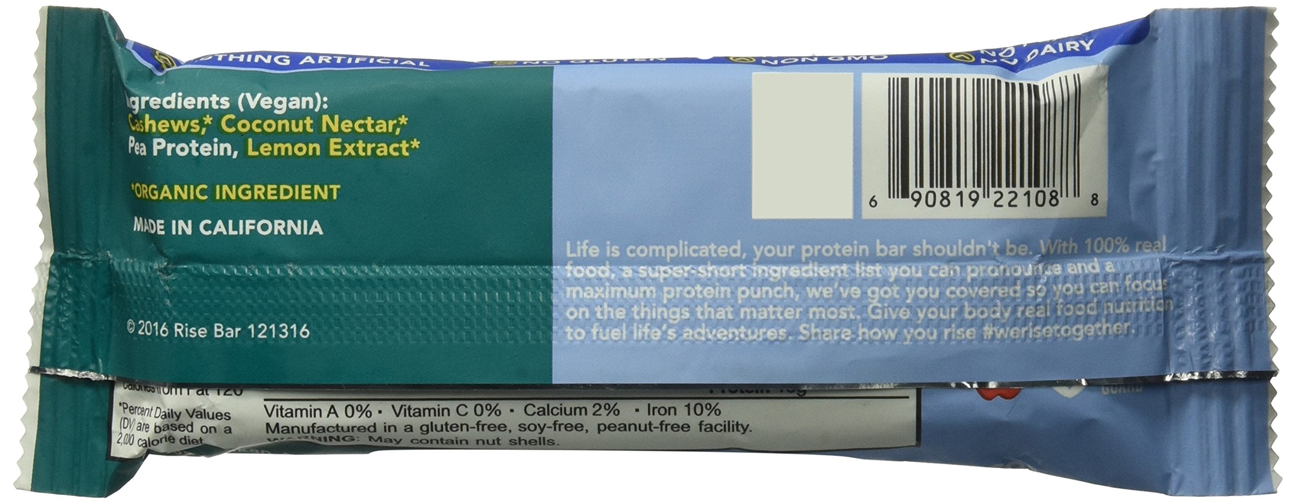 Rise Bar Lemon Cashew bar bite with chewy texture and lemon zest flavor.