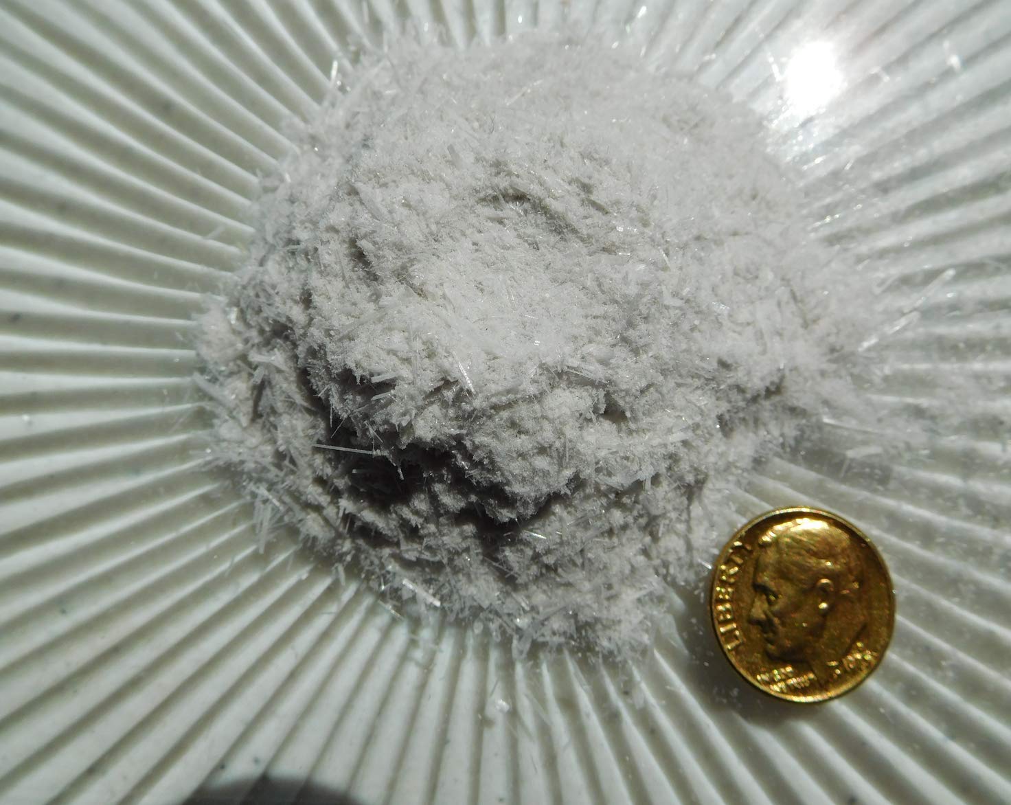 Rise Perspective Selenite Powder shown for art use and jewelry making with sparkle.