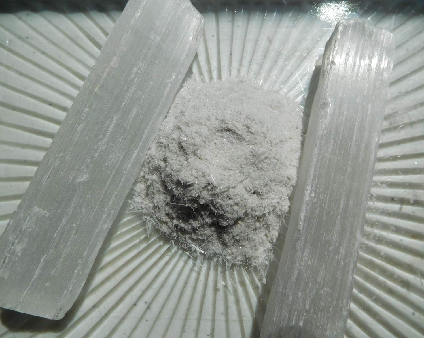 Close-up of fine selenite powder highlighting its texture for art and crafts.