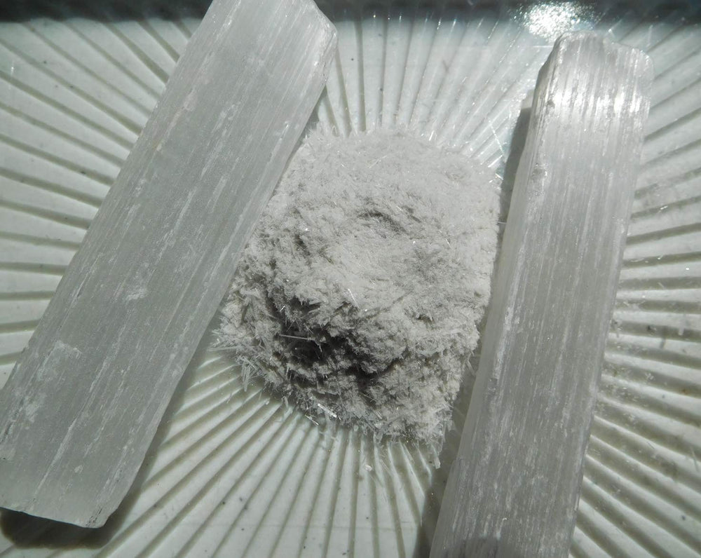 Close-up of fine selenite powder highlighting its texture for art and crafts.