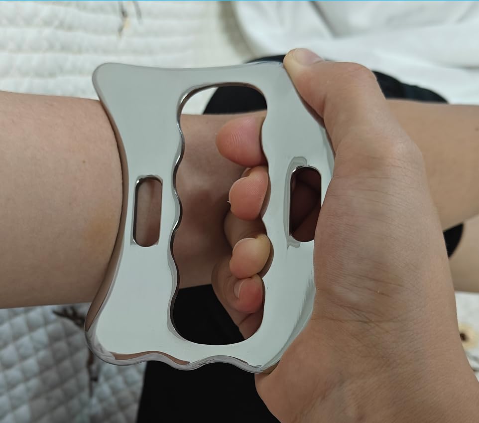 Robulove scraper with narrow edge and contoured shapes for different muscle groups.