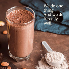 Rock the Shot GLP-1 Support chocolate bottle with measuring scoop emphasizes practical supplementation