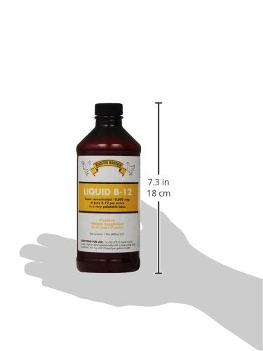 Rooster Booster B-12 Liquid pour shows easy daily poultry nutrition management.