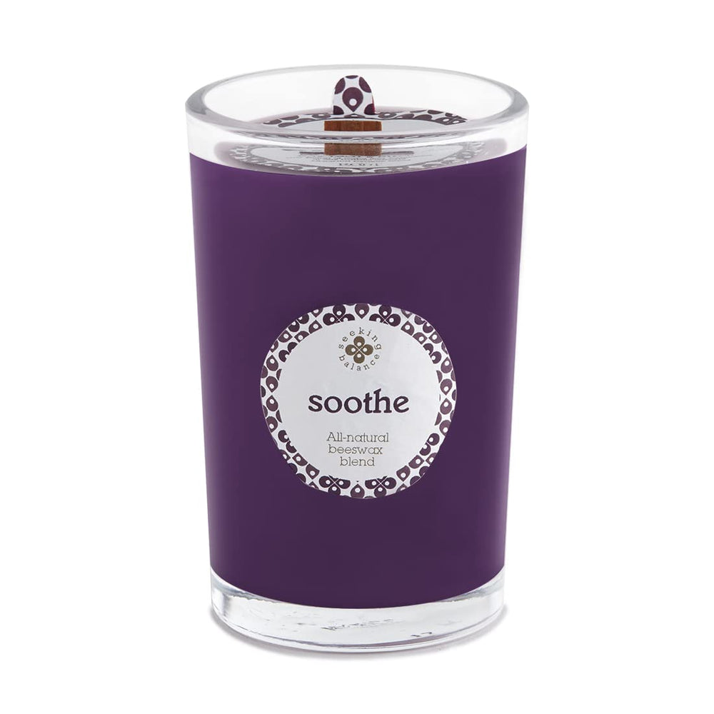 Root Candles Seeking Balance 8oz glass candle fills a room with soothing warmth and ambience.