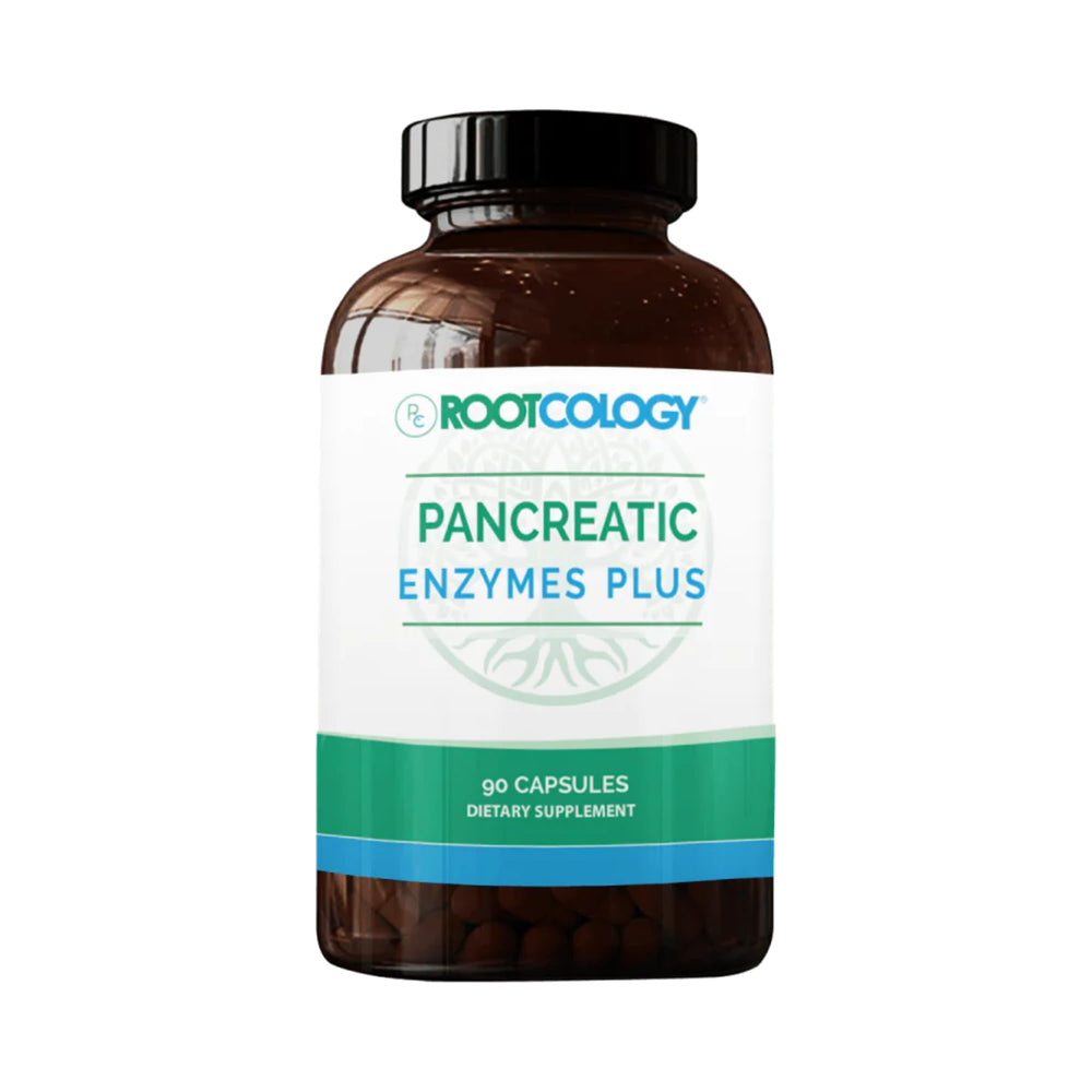 Rootcology Pancreatic Enzymes Plus bottle on table supports digestion after meals.