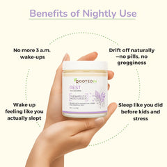 Hand applying Rooted In Rest to the arm before bed for a calming routine.