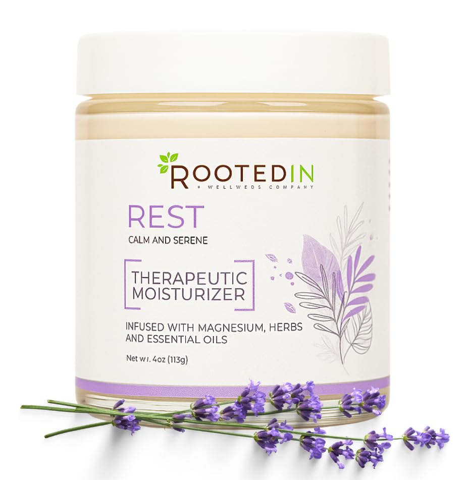 Rooted In Rest magnesium lotion bottle ready for night-time use.