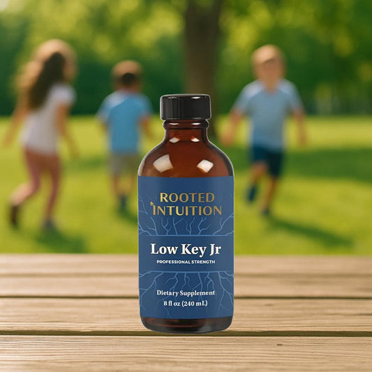 Rooted Intuition Low Key Jr bottle being poured for calm focus