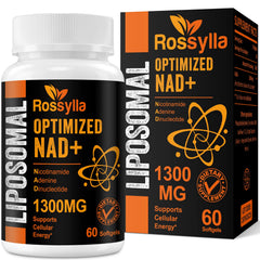 Capsules poured beside a glass of water for daily routine.