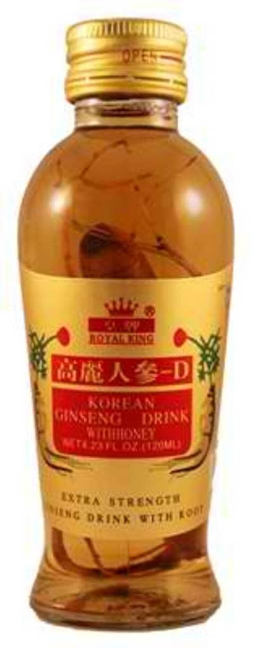 Royal King Ginseng Honey Drink with Root bottle showing real root pieces for authentic energy and flavor.
