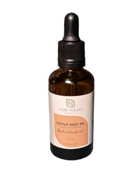 Roze Natura Costus Root Oil bottle with dropper for precise application.