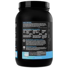 Rule 1 Whey Protein powder being scooped for fast absorption