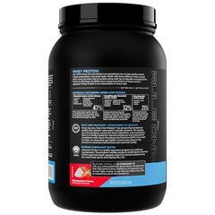 Rule 1 Whey Protein scoop with strawberries creme flavor for shakes