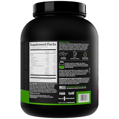 Rule1 Mass Gainer shake being poured into a glass to fuel workouts.