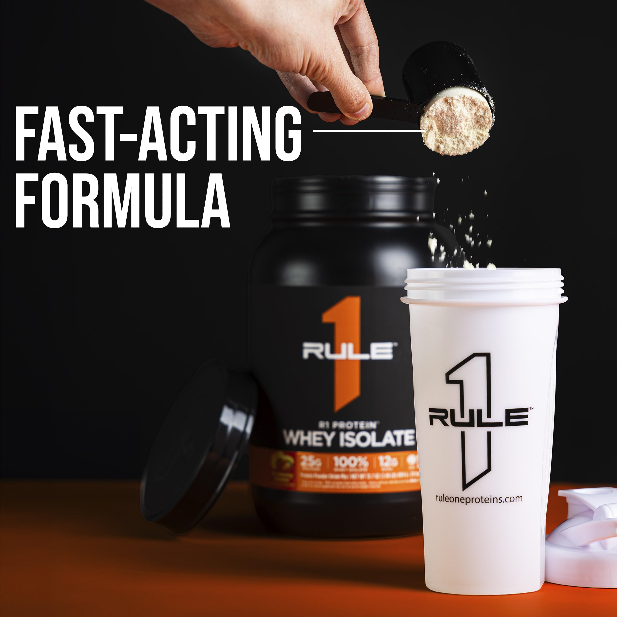Rule 1 R1 Protein Whey Isolate post-workout setup with glass and powder.