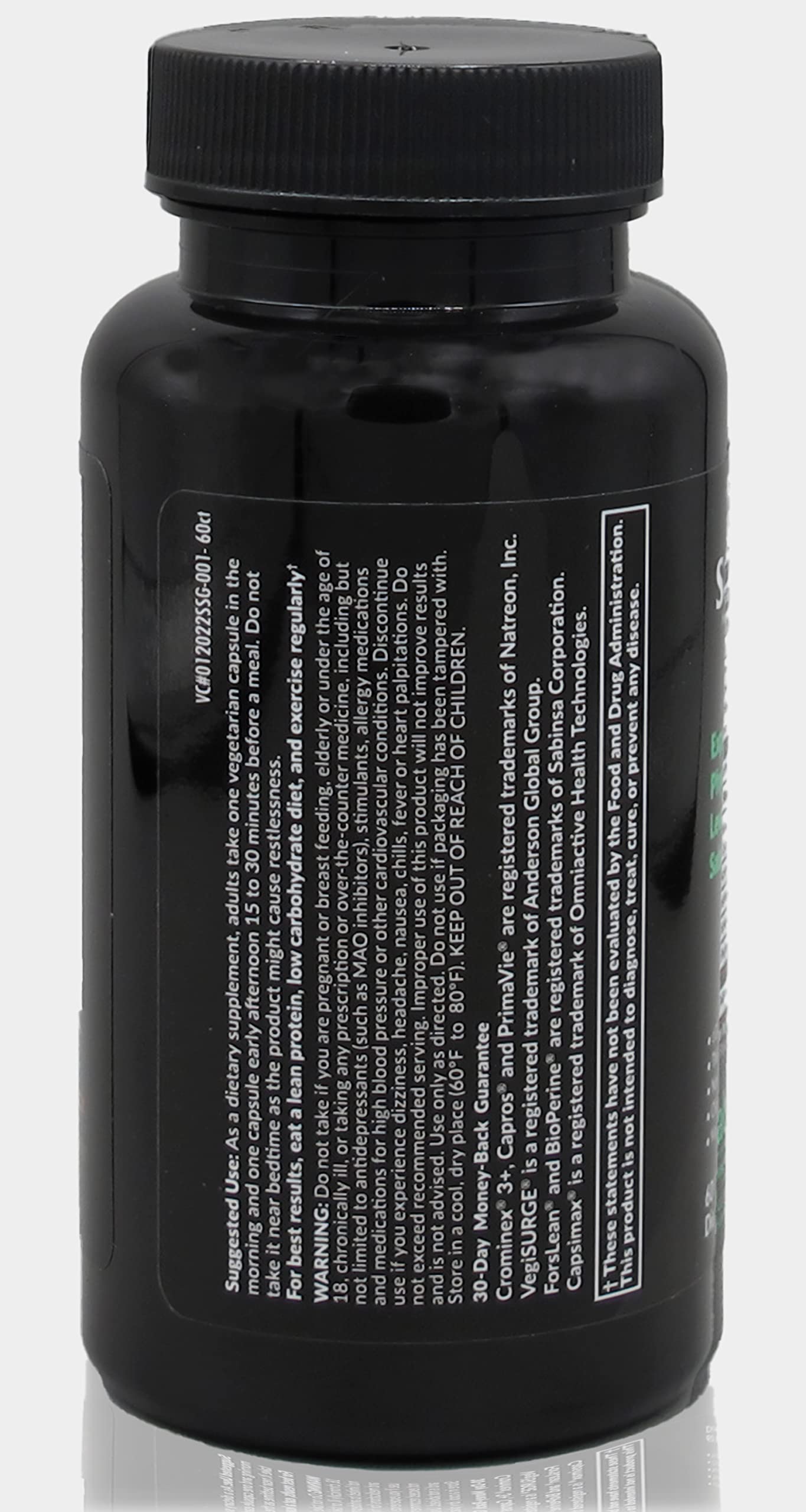 Saba SlimGenix capsules poured into hand illustrating dosage ease.