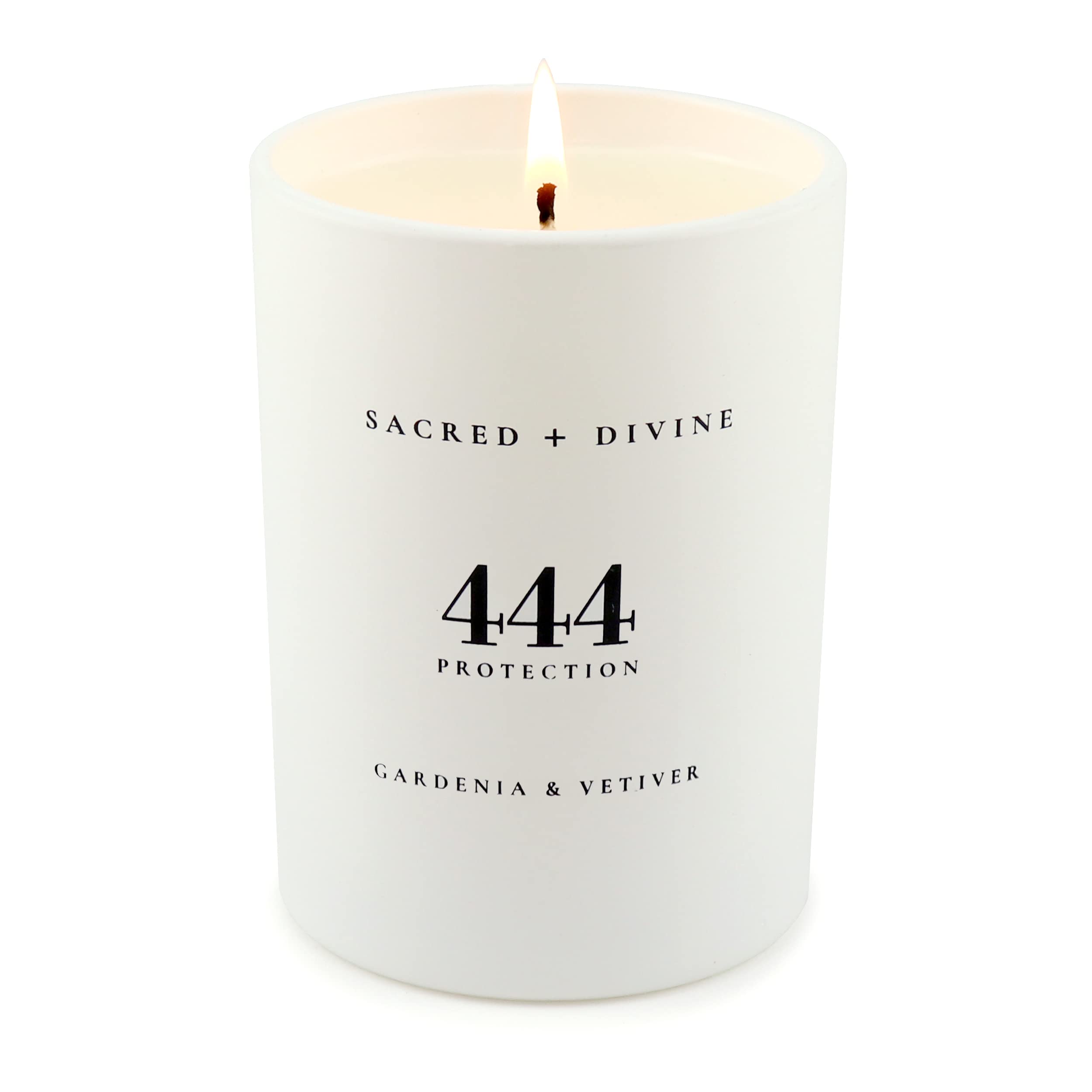 Close-up of Sacred Divine 444 candle showing soy coconut wax quality.