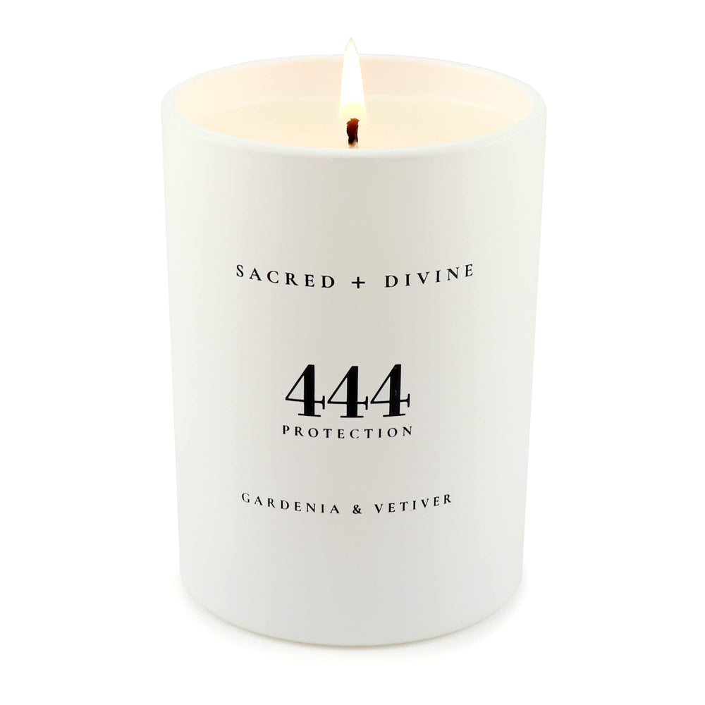 Close-up of Sacred Divine 444 candle showing soy coconut wax quality.