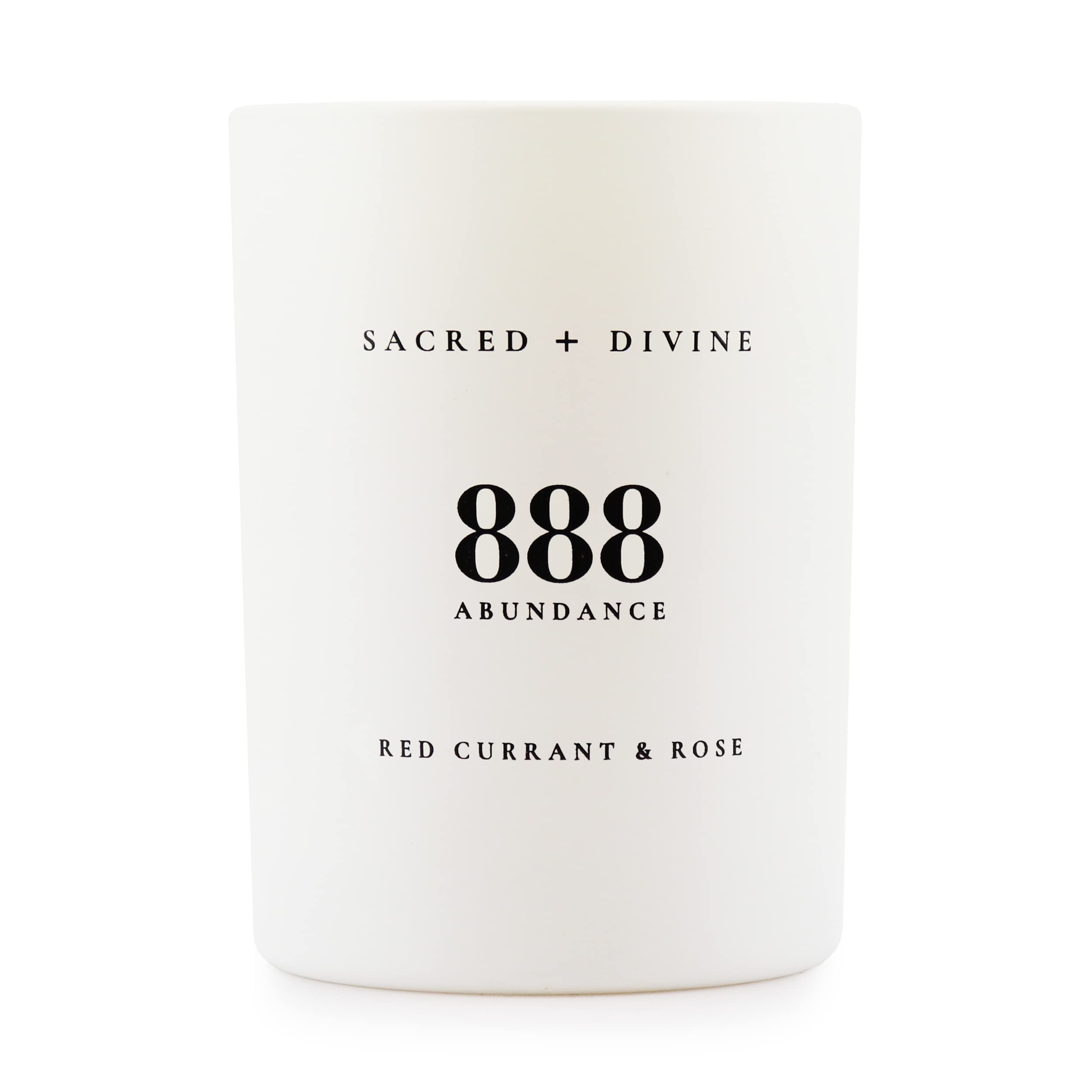 Sacred + Divine 888 abundance candle label close-up for mindful intention setting.