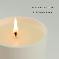 Sacred + Divine 888 abundance candle red currant and rose scent ambiance.