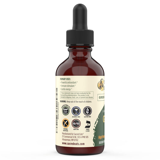 Sacred Eats Green Tea Drops label close-up shows organic, non-GMO ingredients and allergen-free quality.