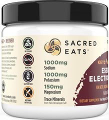 Sacred Eats Keto Electrolyte dissolving in water with lemon raspberry flavor.