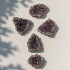 SAMSARI amethyst geode closeup reveals sparkling crystals for serene space energy.