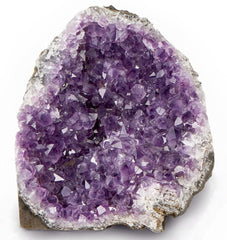 SAMSARI amethyst geode shows purple hues, enhances meditation spaces.