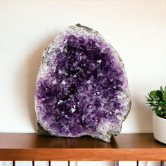 SAMSARI amethyst geode violet crystals close-up, ideal for meditation spaces.