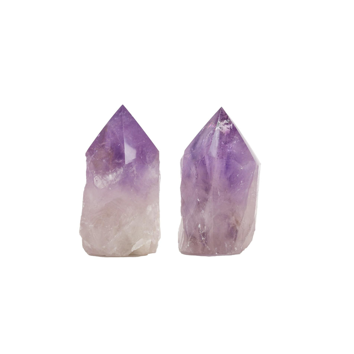 SAMSARI amethyst points, two crystal towers, 2.5-3.5 inches tall, ideal for peaceful meditation spaces.