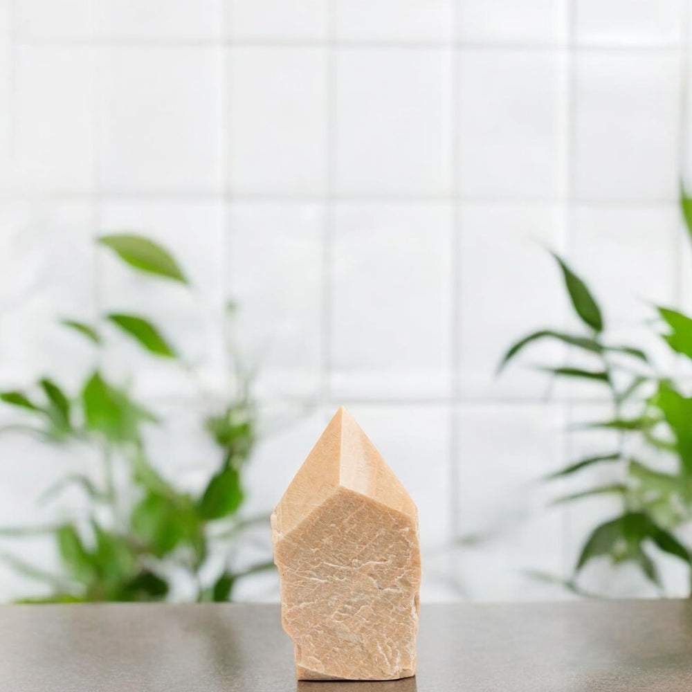 SAMSARI Feldspar crystal point elevates meditation space with natural energy and emotional resilience.