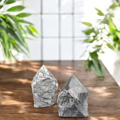 SAMSARI Net Jasper points in hand show compact size for travel.