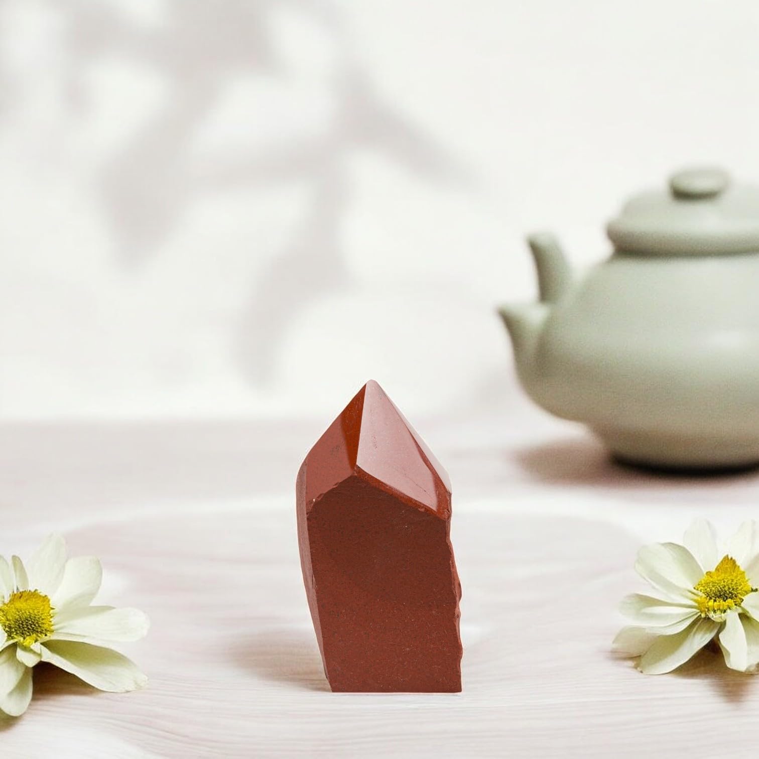 SAMSARI Red Jasper points used for root chakra work and stability