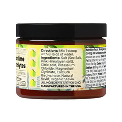 Close-up of Santa Cruz Paleo Lemon Lime powder scoop and glass