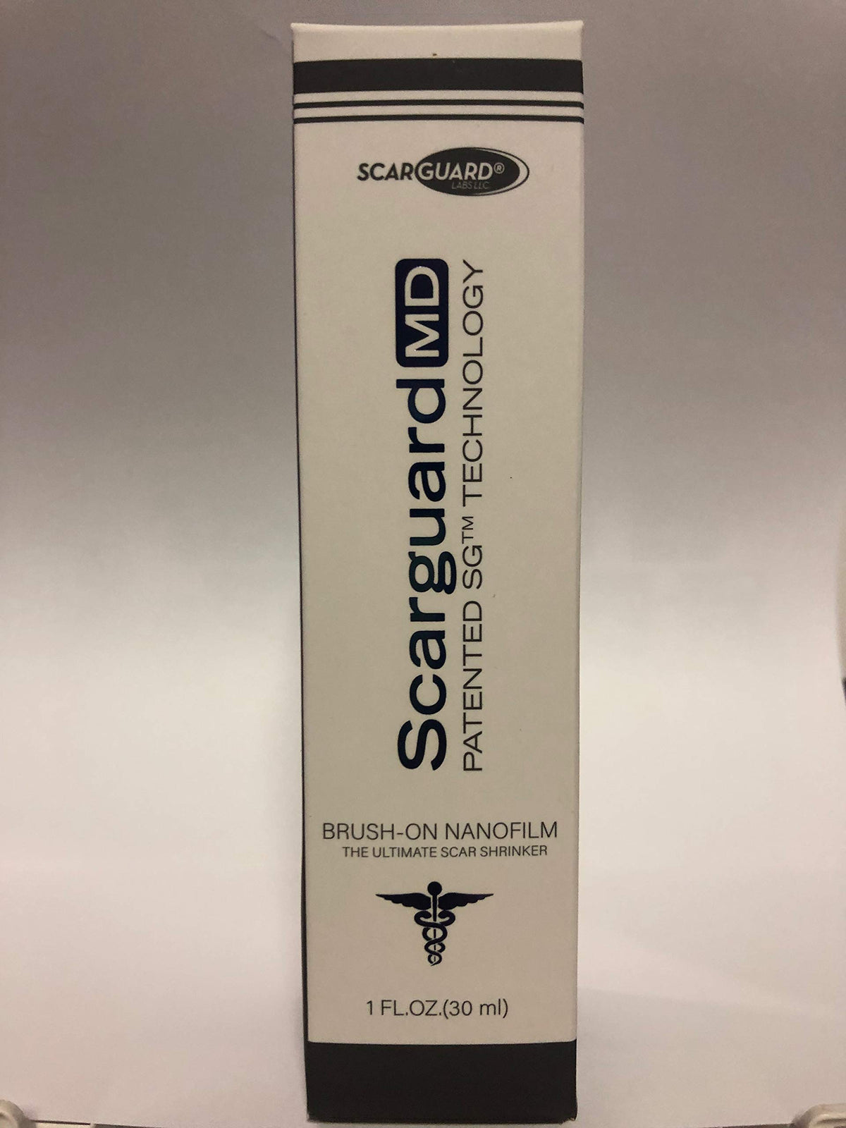 ScarGuard MD clear brush-on liquid improving appearance of new and old scars.