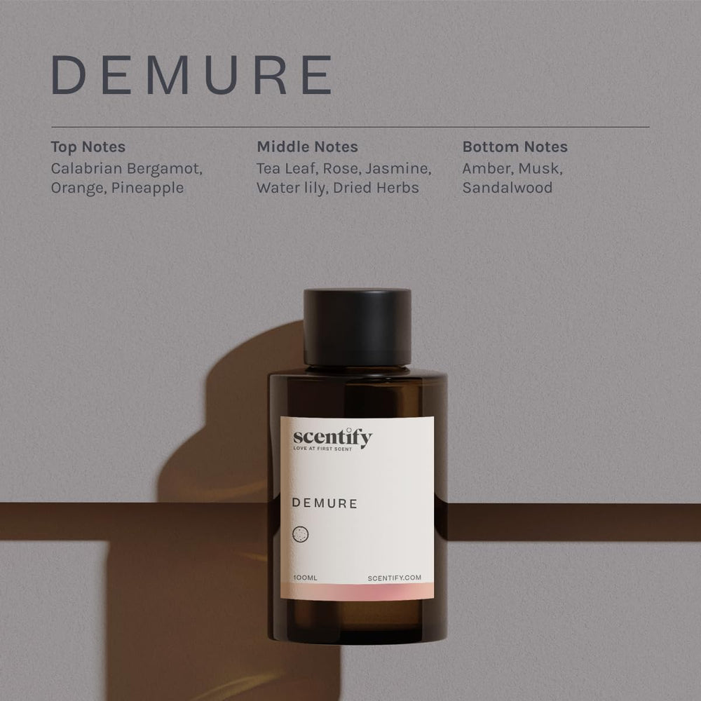 Scentify Demure amber glass bottle highlights premium aroma.
