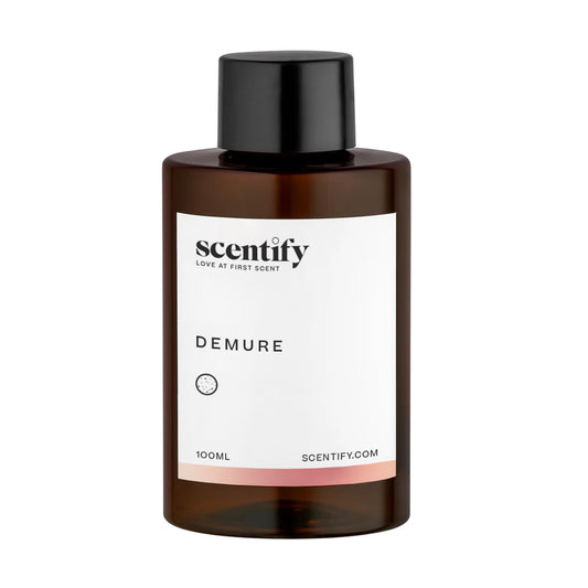 Scentify Demure refill showing musk and sandalwood base for calming spaces.