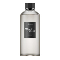 Scentiment Amalfi Coast diffuser bottle highlights a long-lasting aroma for a cozy living room.