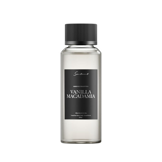 Scentiment Vanilla Macadamia diffuser oil bottle being poured for a cozy room