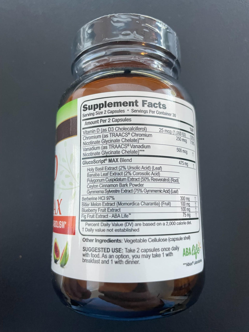 Gluco Script capsules closeup highlighting Berberine blend for metabolic balance.