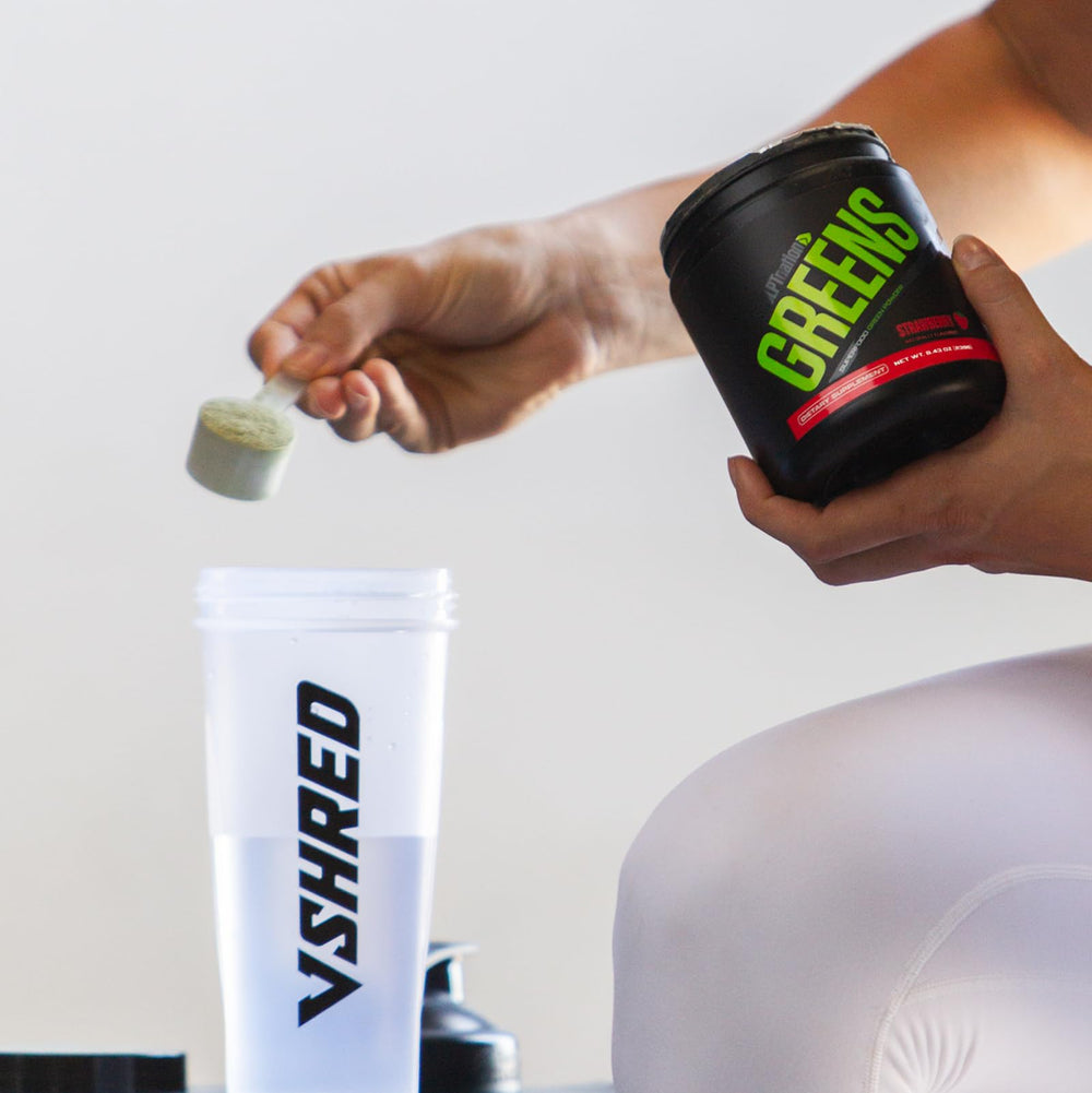 Sculpt Nation Greens Strawberry smoothie prepared with bright berry flavor