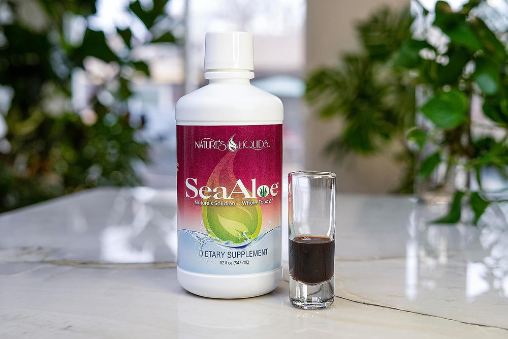 SeaAloe Oceanic Elixir label close-up shows marine botanicals and Aloe Vera for daily energy.