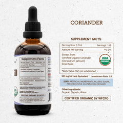 Secrets of the Tribe coriander bottle pour action highlighting clean dosing.